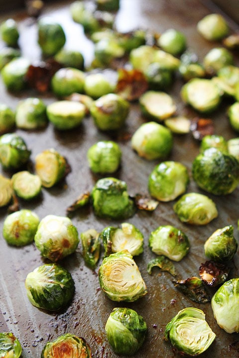 Cranberry Orange Roasted Brussels Sprouts Recipe on twopeasandtheirpod.com Love these brussels sprouts!
