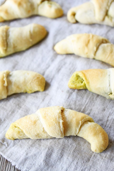 Pesto, Roasted Red Pepper, and Cheese Crescent Rolls on twopeasandtheirpod.com Easy recipe for the holidays! 