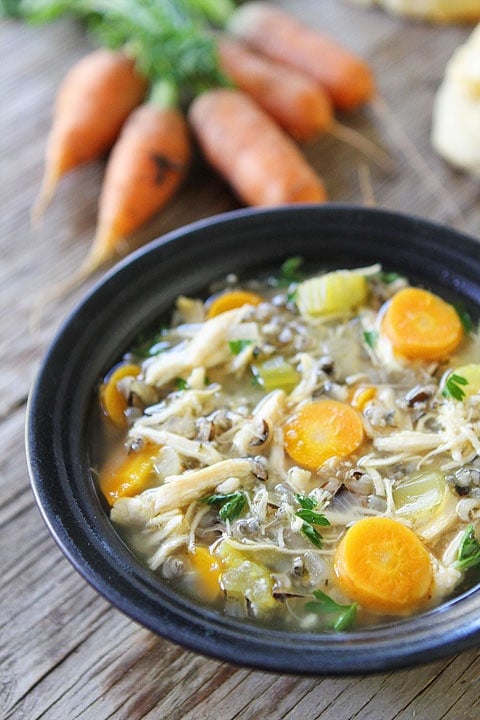 Slow Cooker Chicken and Wild Rice Soup Recipe on twopeasandtheirpod.com This hearty and healthy soup is made in the crockpot!