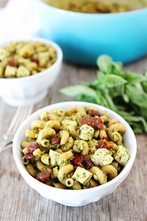 Pesto Chicken Pasta with Sun-Dried Tomatoes Recipe on twopeasandtheirpod.com This pasta dish is always a hit!