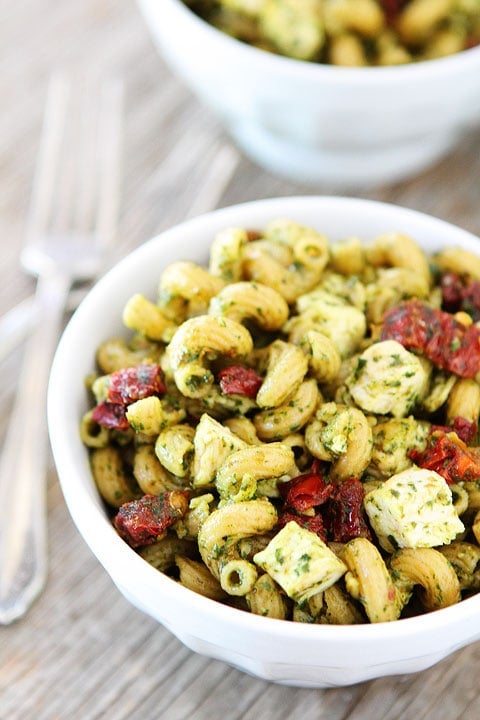 Pesto Chicken Pasta with Sun-Dried Tomatoes Recipe on twopeasandtheirpod.com So easy and SO good! 