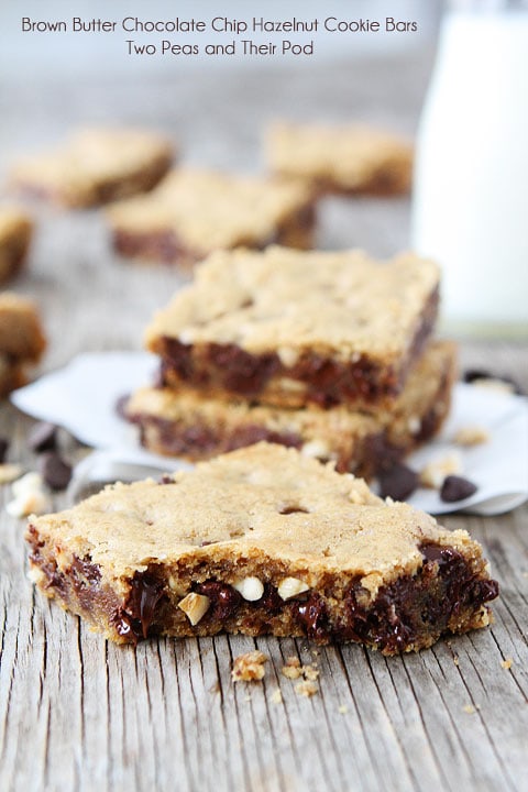 Brown Butter Chocolate Chip Hazelnut Cookie Bar Recipe on twopeasandtheirpod.com Cookie Bar Perfection!