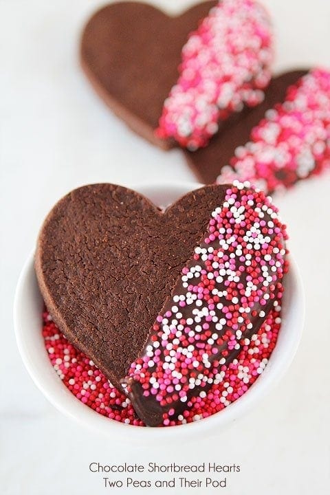 Chocolate Shortbread Heart Cookies on twopeasandtheirpod.com Dipped in chocolate too!