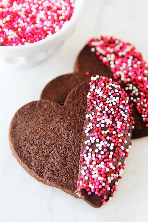 Chocolate Shortbread Heart Cookies on twopeasandtheirpod.com Fun and festive cookies!