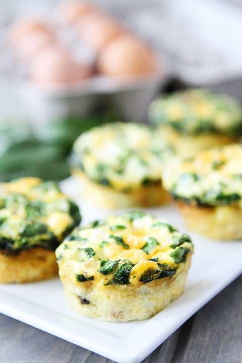 Egg Muffins with Sausage, Spinach, and Cheese on twopeasandtheirpod.com 