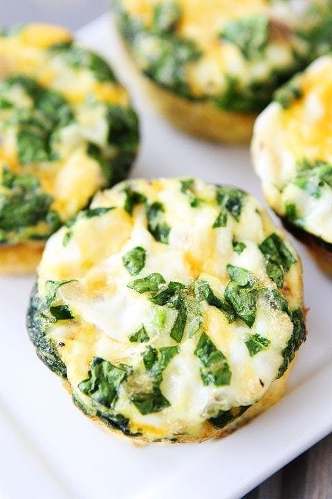 Egg Muffins with Sausage, Spinach, and Cheese on twopeasandtheirpod.com Kids and adults love these egg muffins!