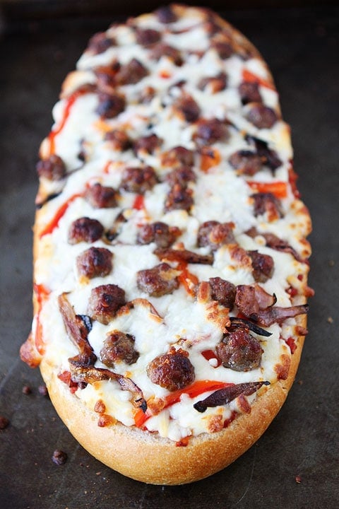 French Bread Pizza with Sausage, Caramelized Onions, and Roasted Red Peppers