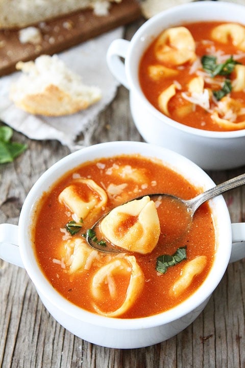 spoon full of creamy tortellini soup