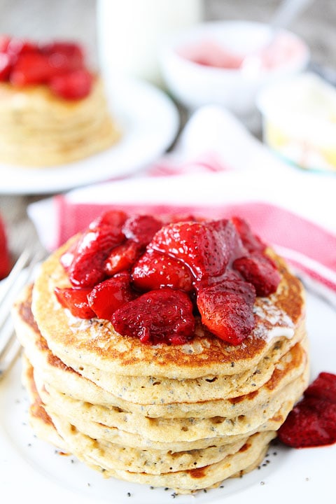 Lemon Chia Seed Pancakes with Roasted Strawberries Recipe on twopeasandtheirpod.com I want a BIG stack!