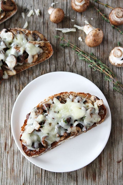 Roasted Mushroom and Gruyere Toasts Recipe on twopeasandtheirpod.com Love this easy recipe!