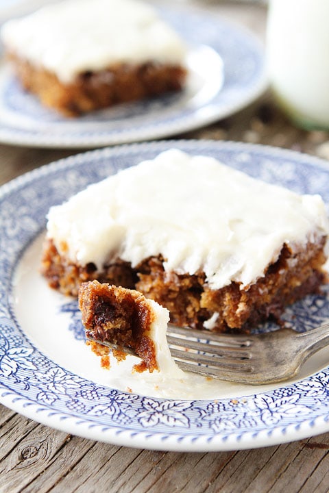 Chocolate Chip Oatmeal Cake with Cream Cheese Frosting Recipe on twopeasandtheirpod.com Who wants a piece?