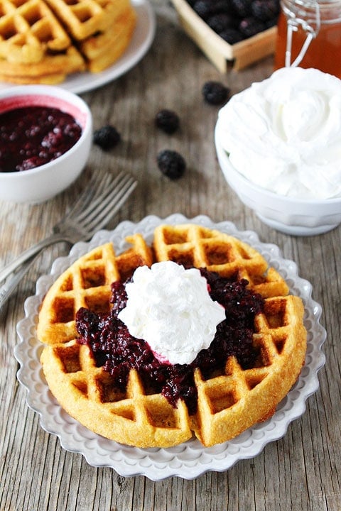 Cornmeal Waffles with Blackberry Compote Recipe on twopeasandtheirpod.com. These waffles are a favorite at our house! 