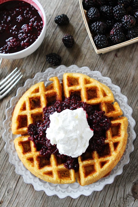 Cornmeal Waffles with Blackberry Compote Recipe on twopeasandtheirpod.com. A great way to start any day! This waffle recipe is SO good!