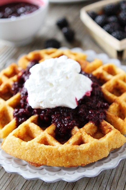Cornmeal Waffles with Blackberry Compote Recipe on twopeasandtheirpod.com. These waffles are AMAZING!