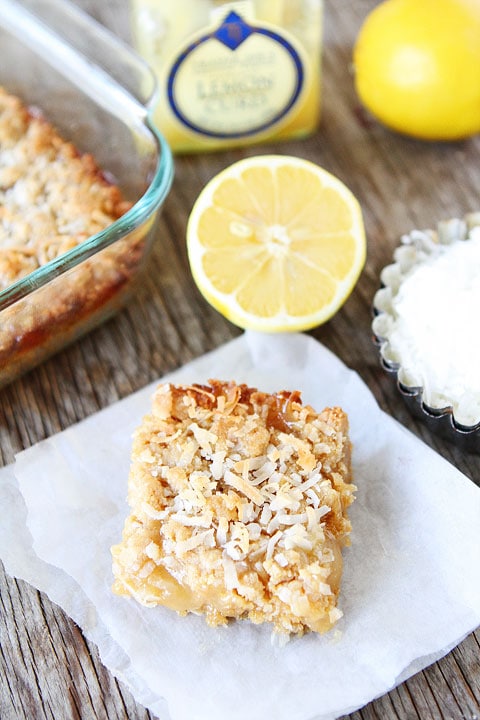 Lemon Coconut Crumb Bars Recipe on twopeasandtheirpod.com The perfect dessert for spring!