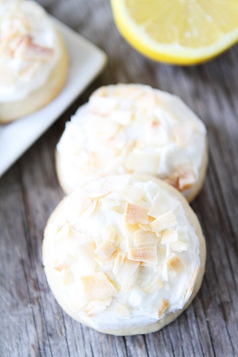 Lemon Cookies with Toasted Coconut Frosting Recipe on twopeasandtheirpod.com Soft lemon cookies with toasted coconut frosting! These cookies are always a hit!