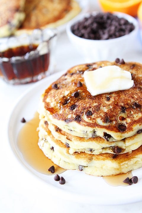 Orange Ricotta Chocolate Chip Pancake Recipe on twopeasandtheirpod.com Light, fluffy, and decadent pancakes!