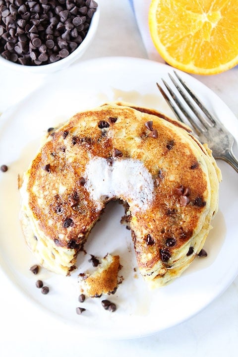 Orange Ricotta Chocolate Chip Pancake Recipe on twopeasandtheirpod.com The BEST pancakes!