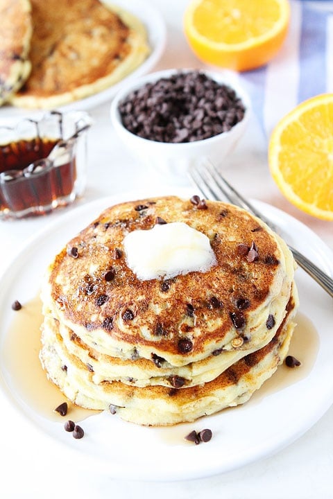 Orange Ricotta Chocolate Chip Pancakes Recipe on twopeasandtheirpod.com You will want a big stack!