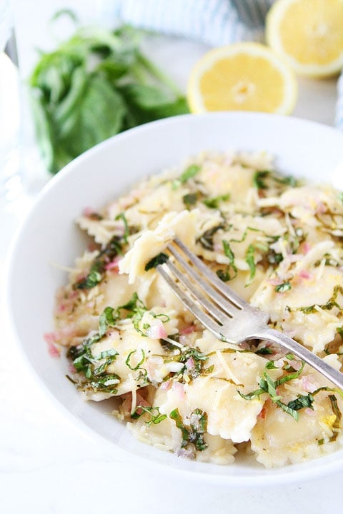 Cheese Ravioli with Lemon Basil Butter Sauce Recipe on twopeasandtheirpod.com The lemon basil butter sauce is amazing! This will become a favorite recipe at your house!