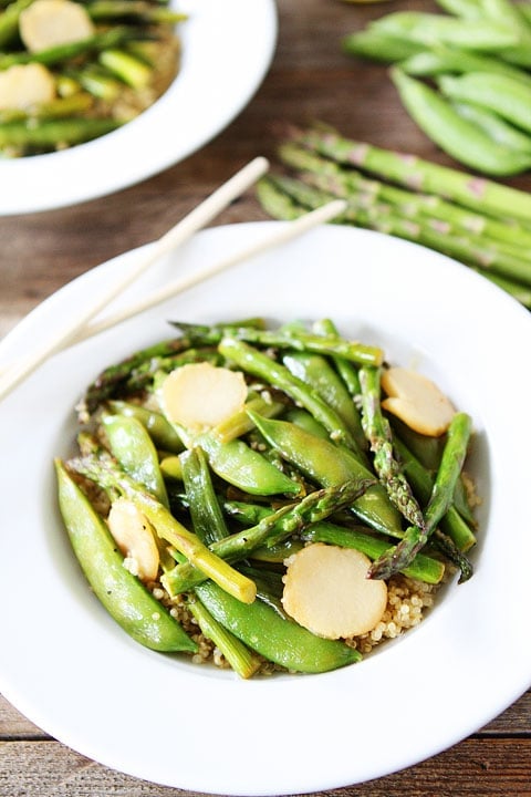 Spring Vegetable Stir Fry with Lemon Ginger Sauce Recipe on twopeasandtheirpod.com. One of our favorite healthy weeknight meals!