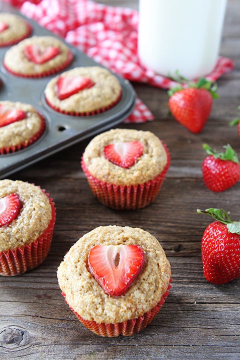 banana muffins with strawberry slices on top