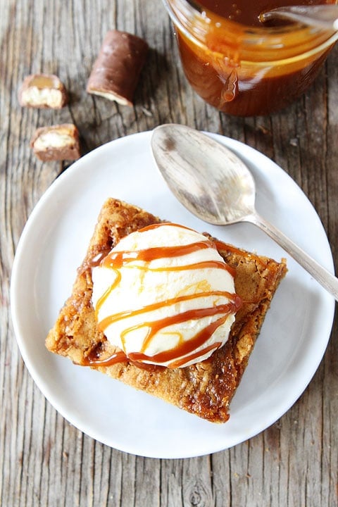 Twix Caramel Cookie Bars Recipe on twopeasandtheirpod.com. Everyone will ask you for the recipe. These bars are amazing!