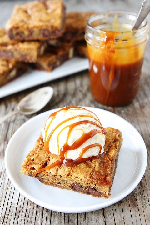 Twix Caramel Cookie Bars Recipe on twopeasandtheirpod.com. Top with ice cream for an extra special dessert!