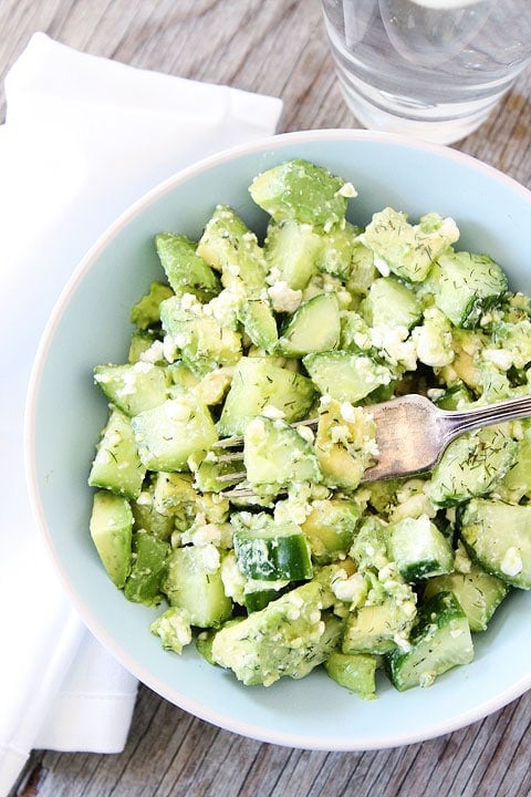 Cucumber, Avocado, and Feta Salad Recipe on twopeasandtheirpod.com. This fresh and simple salad is perfect for summer and it only takes 5 minutes to make!