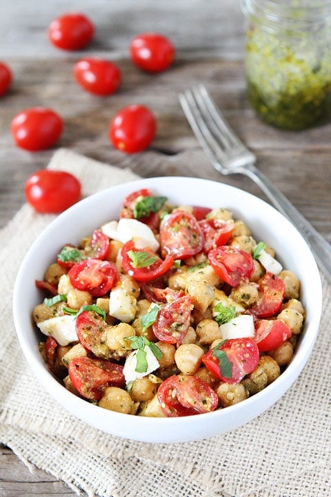Chickpea, Pesto, Tomato, and Mozzarella Salad Recipe on twopeasandtheirpod.com Love this easy and healthy salad! #salad #summer