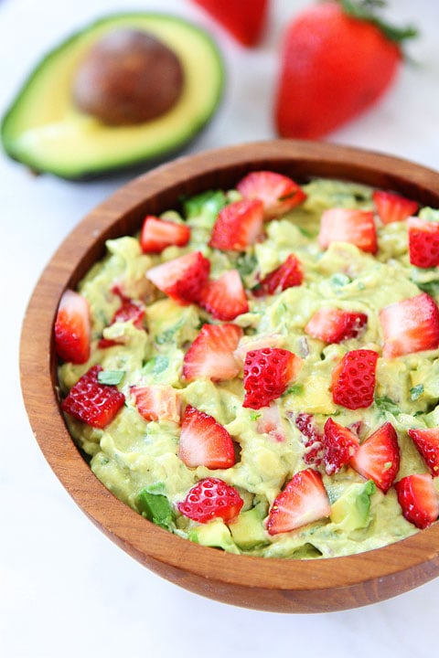 Strawberry Goat Cheese Guacamole Recipe on twopeasandtheirpod.com. Love this creamy and fruity guacamole! #avocado #appetizer #guacamole