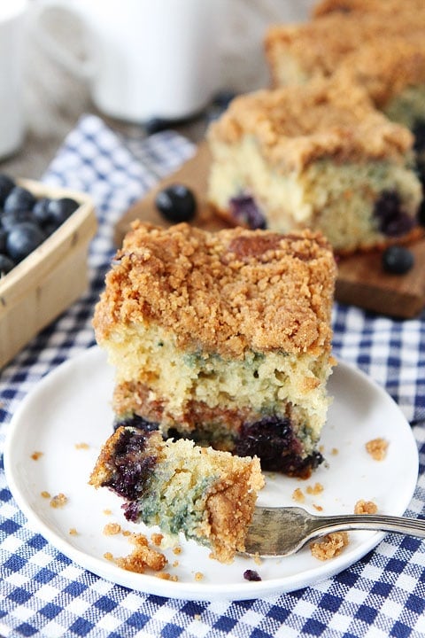 Eating Blueberry Coffee Cake With Fork