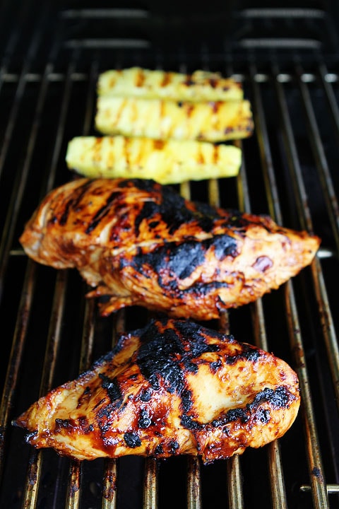 Grilled BBQ Chicken and Pineapple Tacos Recipe on twopeasandtheirpod.com. The perfect taco for summer! 