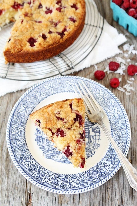 Raspberry Coconut Cake with Coconut Streusel Recipe on twopeasandtheirpod.com Love this simple cake recipe!