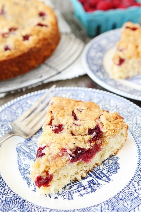 Raspberry Coconut Cake with Coconut Streusel Recipe on twopeasandtheirpod.com This simple summer cake is great for breakfast or dessert! #cake