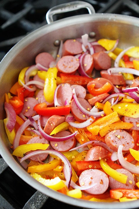 Spicy Sausage and Pepper Pasta Recipe on twopeasandtheirpod.com You can have this colorful pasta dish on your table in 30 minutes!