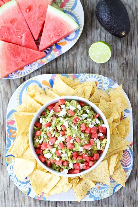 Watermelon Feta Guacamole Recipe on twopeasandtheirpod.com. The perfect guacamoel for summer! #glutenfree #summer