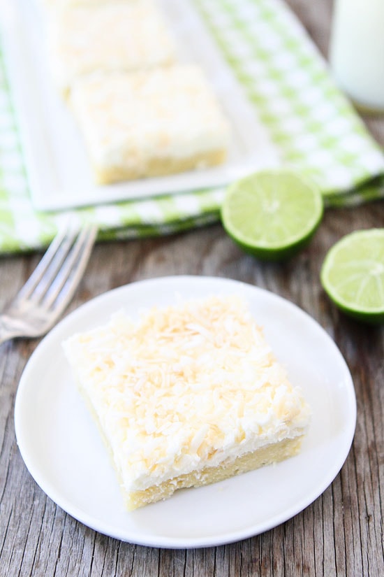 Coconut Lime Sugar Cookie Bars Recipe on twopeasandtheirpod.com Easy coconut lime sugar cookie bars with coconut frosting! 