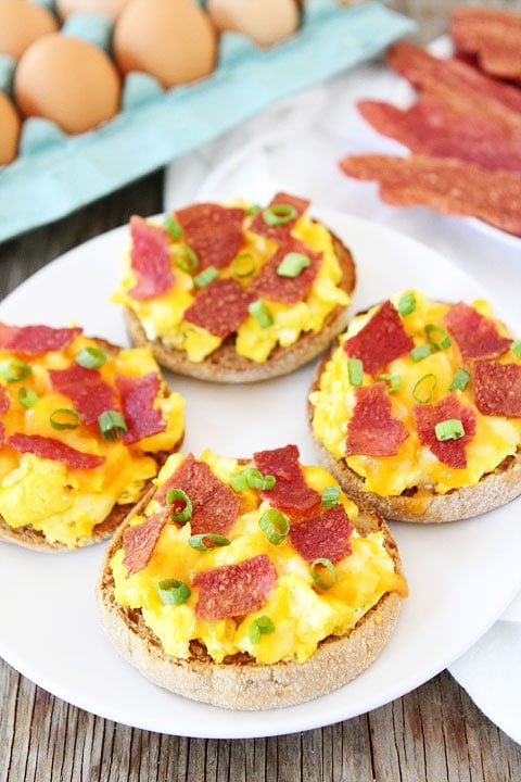 English Muffin Breakfast Pizzas on twopeasandtheirpod.com A quick and easy breakfast recipe for back to school time! 