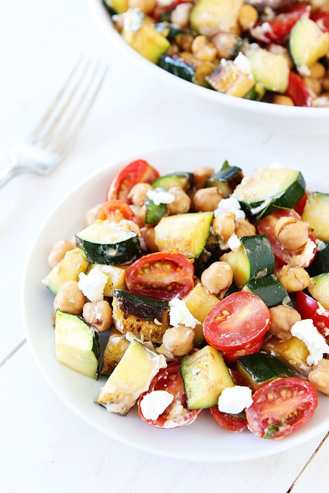 Grilled Zucchini, Chickpea, Tomato, and Goat Cheese Salad Recipe on twopeasandtheirpod.com A great way to use up the summer zucchini! 