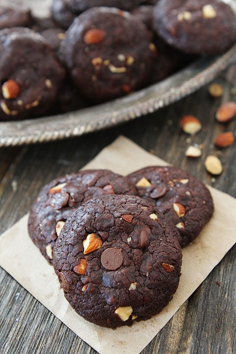 Vegan Chocolate Almond Cookies Recipe on twopeasandtheirpod.com Rich and fudgy chocolate cookies with almonds and chocolate chips! #vegan #chocolate