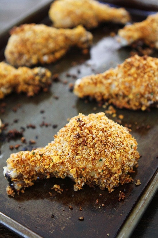 baked fried chicken drumsticks on baking sheet