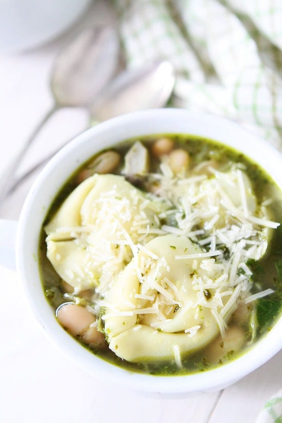 Spinach Artichoke Pesto Tortellini Soup Recipe on twopeasandtheirpod.com This tortellini soup is full of flavor and is so easy to make!