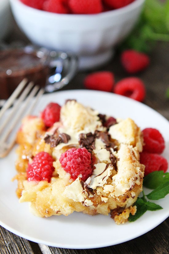 Raspberry Chocolate Bread Pudding Recipe on twopeasandtheirpod.com The perfect holiday dessert! 