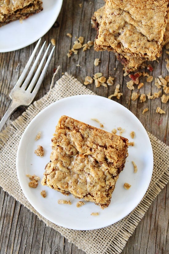 Granola Cake Recipe on twopeasandtheirpod.com This simple cake is soft, chewy, and SO good! Serve for dessert or even breakfast! Granola Cake Recipe on twopeasandtheirpod.com