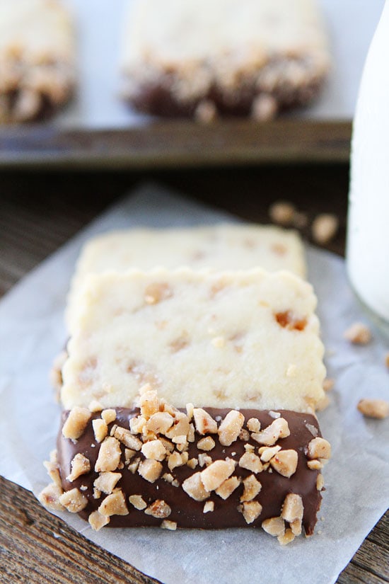 Chocolate Dipped Toffee Shortbread Recipe on twopeasandtheirpod.com 