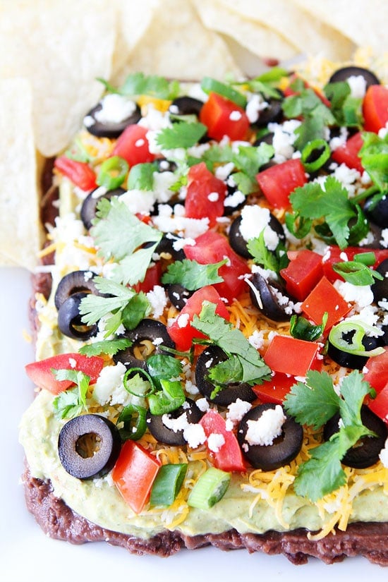 Mexican Layer Dip Recipe on twopeasandtheirpod.com 