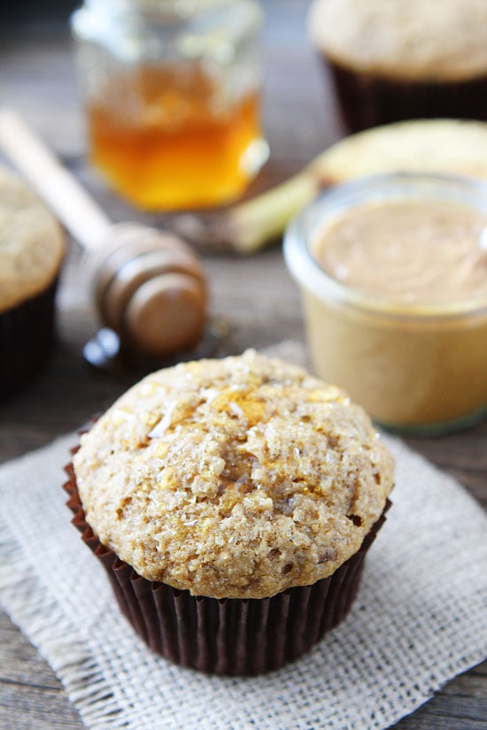 Peanut Butter, Banana, and Honey Muffins Recipe on twopeasandtheirpod.com If you like peanut butter, banana, and honey sandwiches, you will love these simple and healthy muffins! They are great for breakfast or snack time! peanut butter banana muffins drizzled with honey