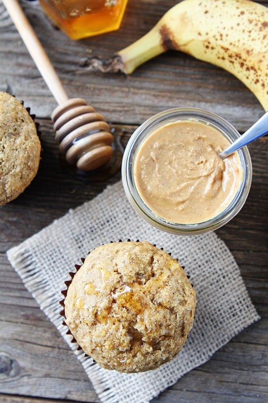 Peanut Butter, Banana, and Honey Muffins Recipe on twopeasandtheirpod.com These healthy muffins are great for breakfast or snack time! peanut butter muffins made with honey and bananas