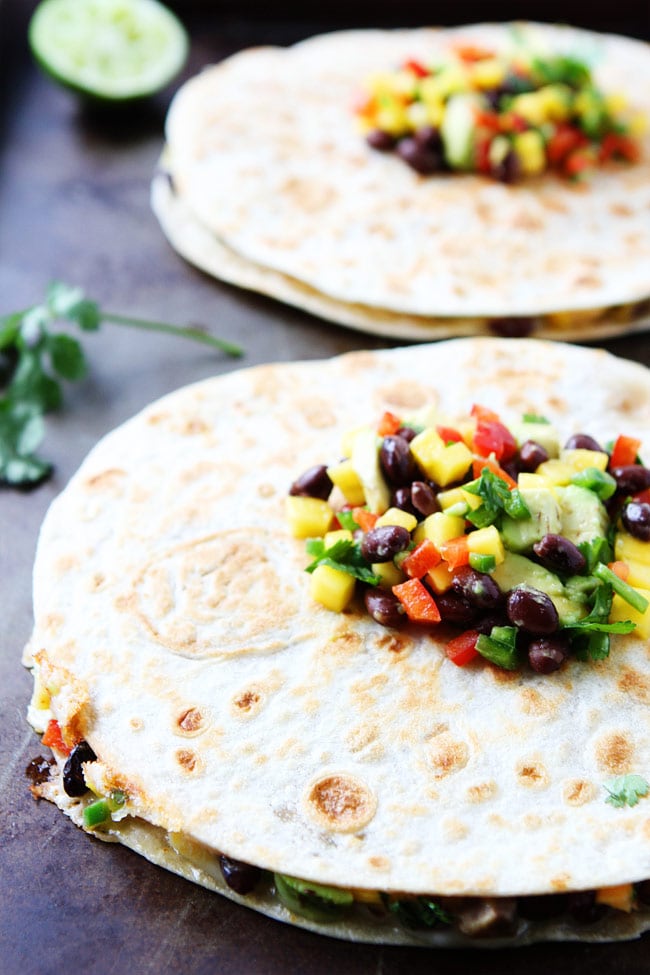 Mango Black Bean Quesadillas made with flour tortillas. A quick an easy dinner the entire family will love!